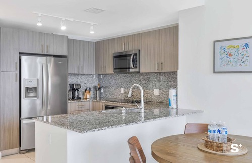 Doral Condo | Modern 1BR in Downtown Doral | Free Parking and Wellness Amenities