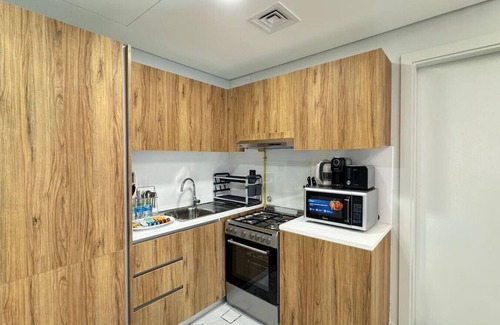 Abu Dhabi Apartment | Modern 1BR with Balcony & Full Kitchen Al Maryah