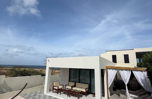 Lagun House | Modern 2-Bedr Oceanfront Villa with Hot Tub & Lounge Patio