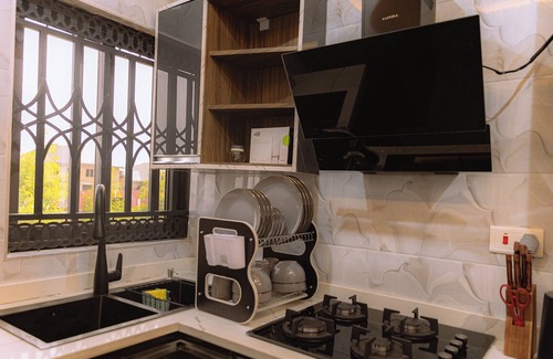 Accra Apartment | Modern 2-bedroom apartment with WiFi, AC in lovely Accra-Winneba Road,Blue Rose