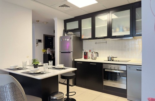Madinat Zayed Apartment | Modern 2BR | Balcony & Sea View | Near Marina Walk