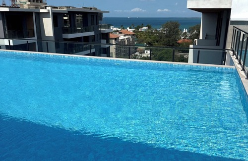 Masaki Apartment | Modern 2BR Condo with Gym & AC in Upscale Masaki