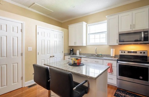 East Durham House | Modern 3-bedroom house, TV each room,big fence yard, Pet stay free, Lighted Deck