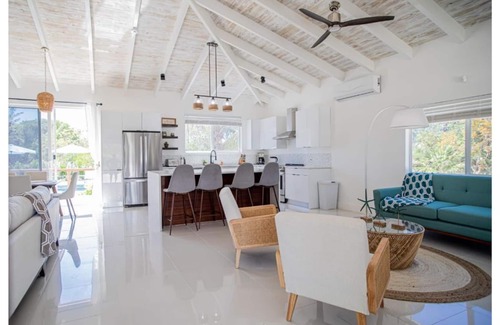Grace Bay House | Modern 4BR oasis on 1 acre, 1 min from stunning Leeward Beach
