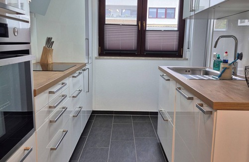 Schwieberdingen Apartment | Modern 5-room apartment with roof terrace and conservatory