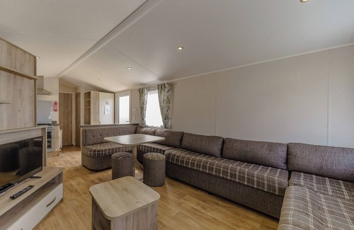 Bleadon House | Modern and contemporary 12ft-wide caravan with one double and two twin.
