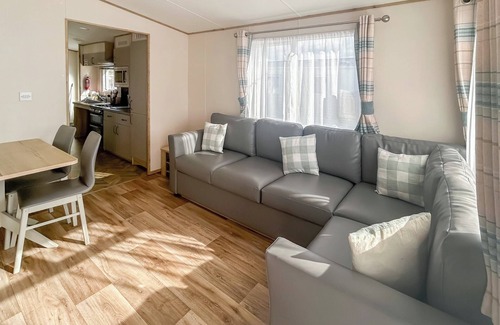Bleadon House | Modern and contemporary 12ft-wide caravan with one double and two twin.