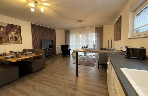 Losheim am See Apartment | Modern and centrally located holiday apartment with a large balcony.