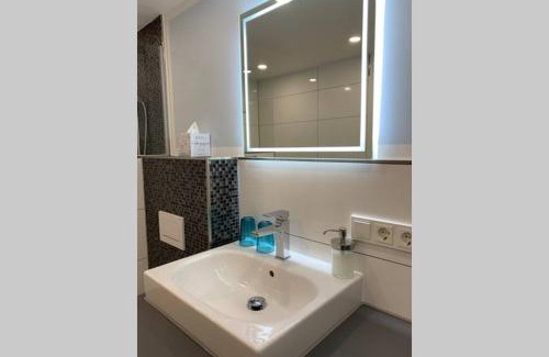 Putzchen/Bechlinghoven Apartment | Modern apartment especially suited for business consultants I close to DT, DHL & UN Campus I reserved parking & personal shuttle to UN campus on demand