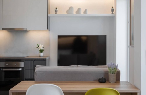 Vouliagmeni Villa | Modern Athens Apartment | Apartment Luxe | 1 Bedroom | Balcony with Garden.