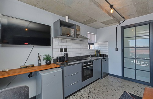 West Beach Apartment | Modern Coastal Escape 2min to Blouberg Beach With Fast WiFi and Power Backup