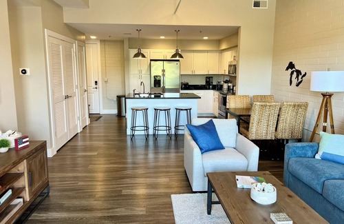 Manistee Condo | Modern condo on Manistee River just steps away from downtown!