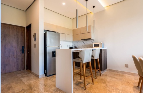 Playa Paraiso Condo | Modern condo with rooftop infinity pool, hot tub, jetted hot tub & WiFi