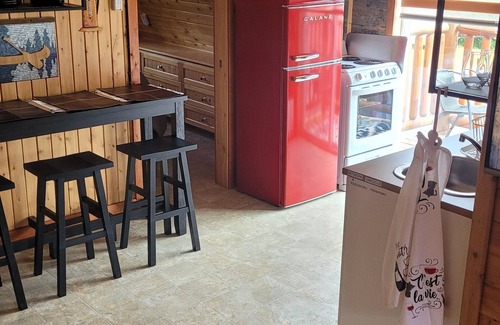 Acadian Peninsula Apartment | Modern Costa Del Sol Flat Overlooking Pokemouche River, with swimming off dock.n