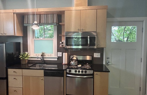 Historic Montford Apartment | Modern, cozy studio "in the trees" in historic neighborhood; walk to downtown.
