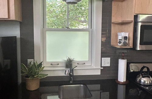 Historic Montford Apartment | Modern, cozy studio "in the trees" in historic neighborhood; walk to downtown.