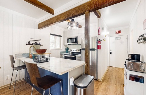 Fish Camp House | Modern duplex cabin with fireplace, balcony, & EV charger plus mountain views