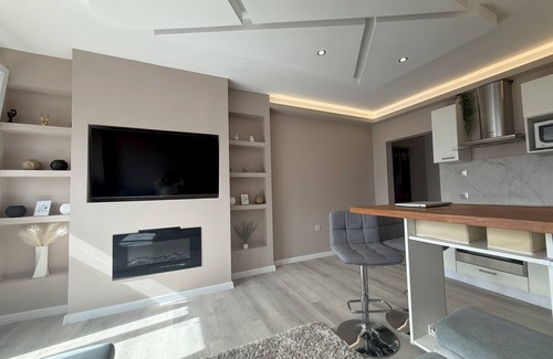 Kaposvar Apartment | Modern Flat w/Home Office, Balcony & Fireplace