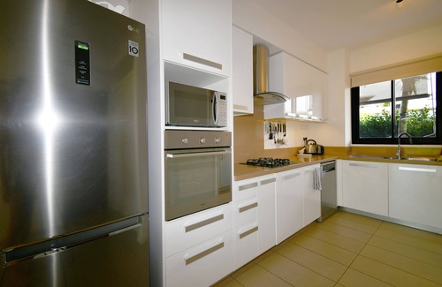 Roches Noires Apartment | Modern ground-floor apartment, wifi, private garden