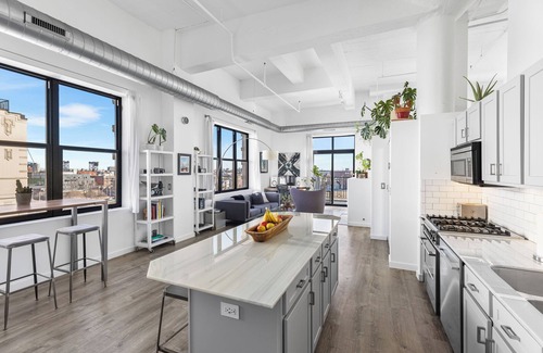 University Village / Little Italy Condo | Modern Historic Loft 19ft Ceilings, Gym, Heated Parking, Skyline Views + Balcony