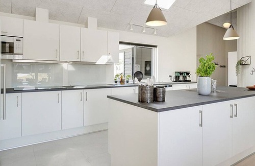 Mommark Strand House | Modern holiday home with pool, activity room, WiFi, oven and large kitchen
