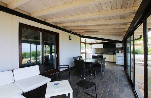 Campofelice di Roccella Villa | Modern Villa with Private Golf Practice, Pool, Garden, Terrace, Wi-Fi, Sea View