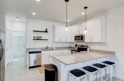 Vineyard House | Modern Kitchen and Living Room, King Bed