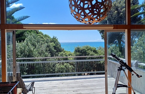 Whiritoa House | Modern Kiwi family bach right on the beach. Private & pet friendly.