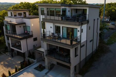 Talbot's Corner House | Modern Luxury Hot Tub Mini Golf Elevator Views