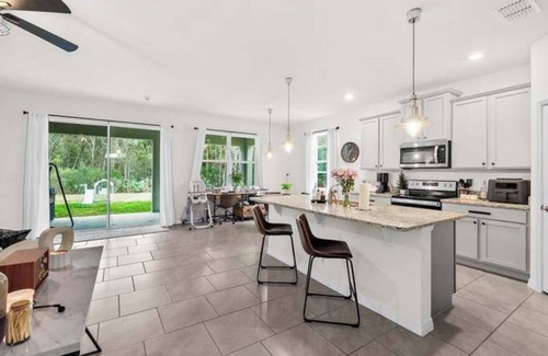 New Smyrna Beach House | Modern Luxury w/included activities on Nature Preserve by Beach. Pet friendly!