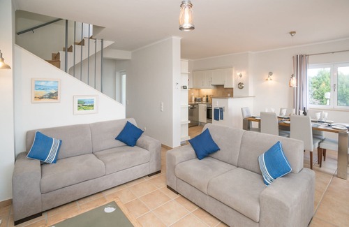 Calicas House | Modern Ocean-view Townhouse by Ideal Homes