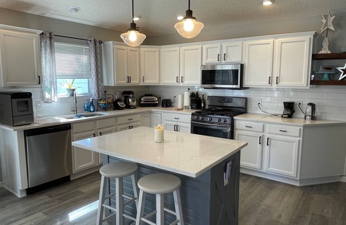 Duval House | Modern Open-Plan Home w/Updated Kitchen, Private Lanai & Golf Cart