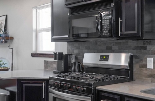 North Park House | Modern pet friendly retreat minutes from downtown, airport & hospital corridor.