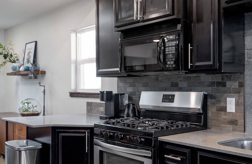 North Park House | Modern pet friendly retreat minutes from downtown, airport & hospital corridor.