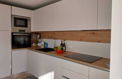 Auronzo di Cadore Apartment | Modern renovated vacation apartment in Auronzo di Cadore with lake view & two balconies