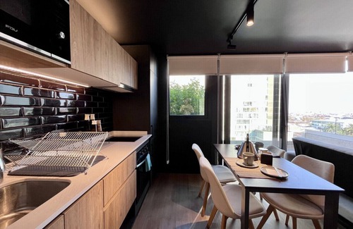 Downtown Santiago Apartment | Modern Studio Apartment, Terrace & Workspace with Panoramic Views