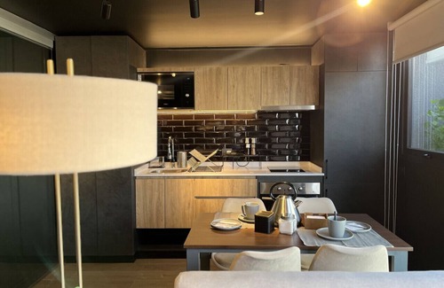 Downtown Santiago Apartment | Modern Studio Apartment, Terrace & Workspace with Panoramic Views