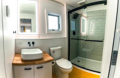 Johnson House | Modern Tiny House with hot tub & river near Stowe