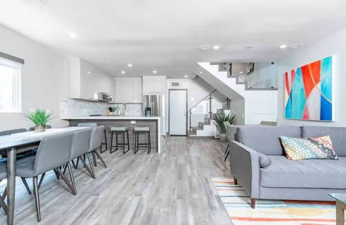 West Newport Condo | Modern Tri-Level Condo | AC & Rooftop Deck | Tons of Lounge Space | It's Got the Wow Factor