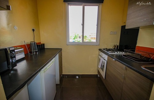 Brusubi Apartment | Modern Well run Apartments with pool, walking distance to the beach