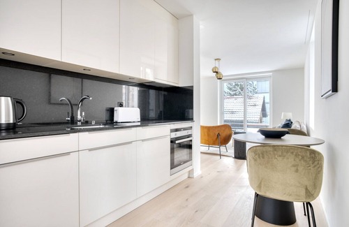 Sihlfeld Apartment | Modern Wiedikon 2.0 Room w/Storage & W/D, 3 min to Market, by Blueground