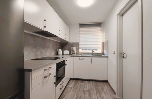 Braunsen Apartment | Moderne Ferienwohnung Maxima 3 für Max. 4 Personen mit Balkon