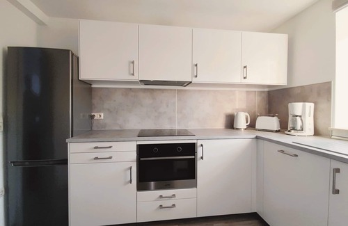 Braunsen Apartment | Moderne Ferienwohnung Maxima 3 für Max. 4 Personen mit Balkon