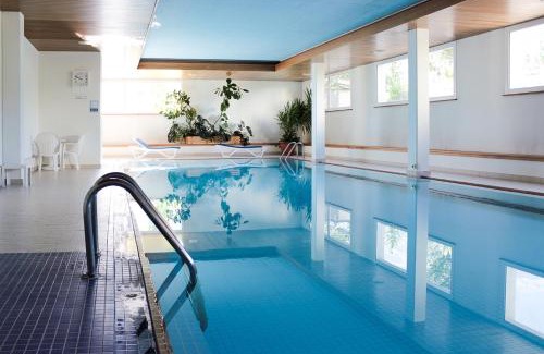 Champfer Apartment | Modernes Alpenstudio mit Bergblick, Pool und Sauna
