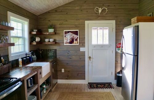 Round Top Cabin | Molly Cabin - Private cabin with 2 bedrooms, one queen and one king bed, full bath with walk-n-shower. Full kitchen with fridge/ice maker, coffee bar, front and back porches, private out door fire pit, outdoor shower.