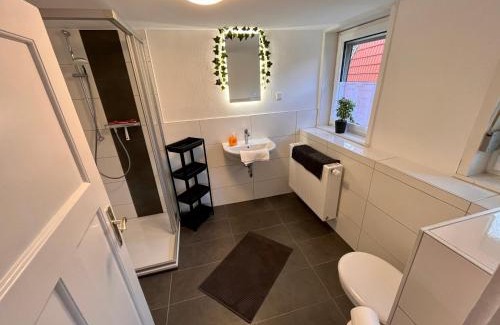 Fuldatal Apartment | Monteurunterkunft Simmershausen - Parken, Waschen und Wifi inklusive