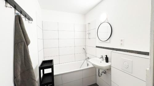 Stadtbezirk West Apartment | Monteurwohnungen mit TV, Internet, Parkplatz, Waschmaschine, Küche, Balkon, Restaurants und Supermarkt
