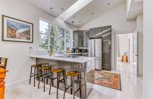 Stevenson House | Mountain and river-view home + studio with fireplace, grills, outdoor areas