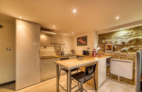 Griffon - Royale Apartment | Movie Room – Immersion unique et atmosphère cosy assurée
