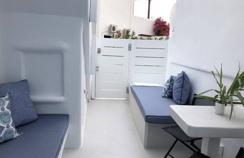 Platis Gialos Apartment | Mykonian Mews H1 Luxury Cave Suite with outdoor jacuzzi, lounge and cuisinette